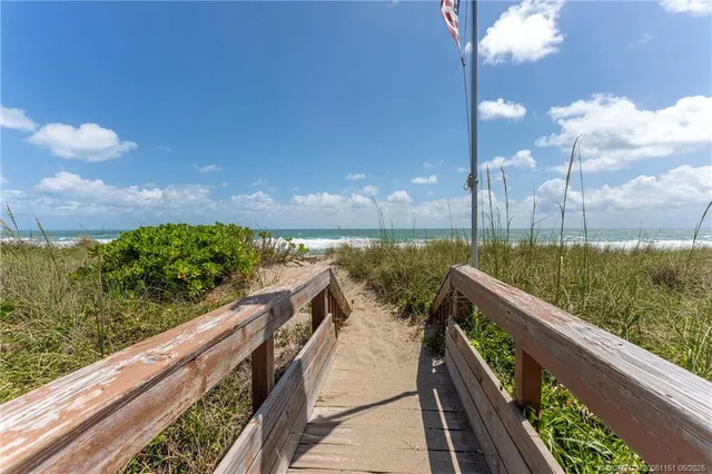 a view of mountain from a balcony