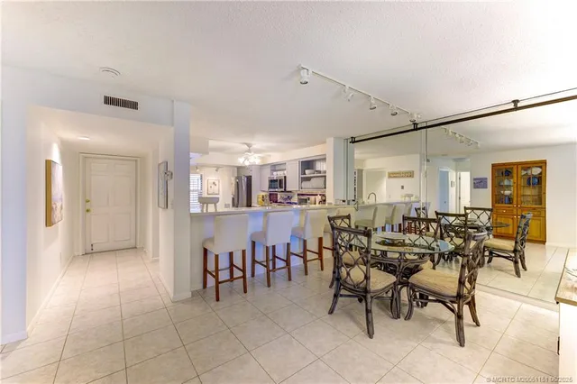 a view of a livingroom with furniture and a table