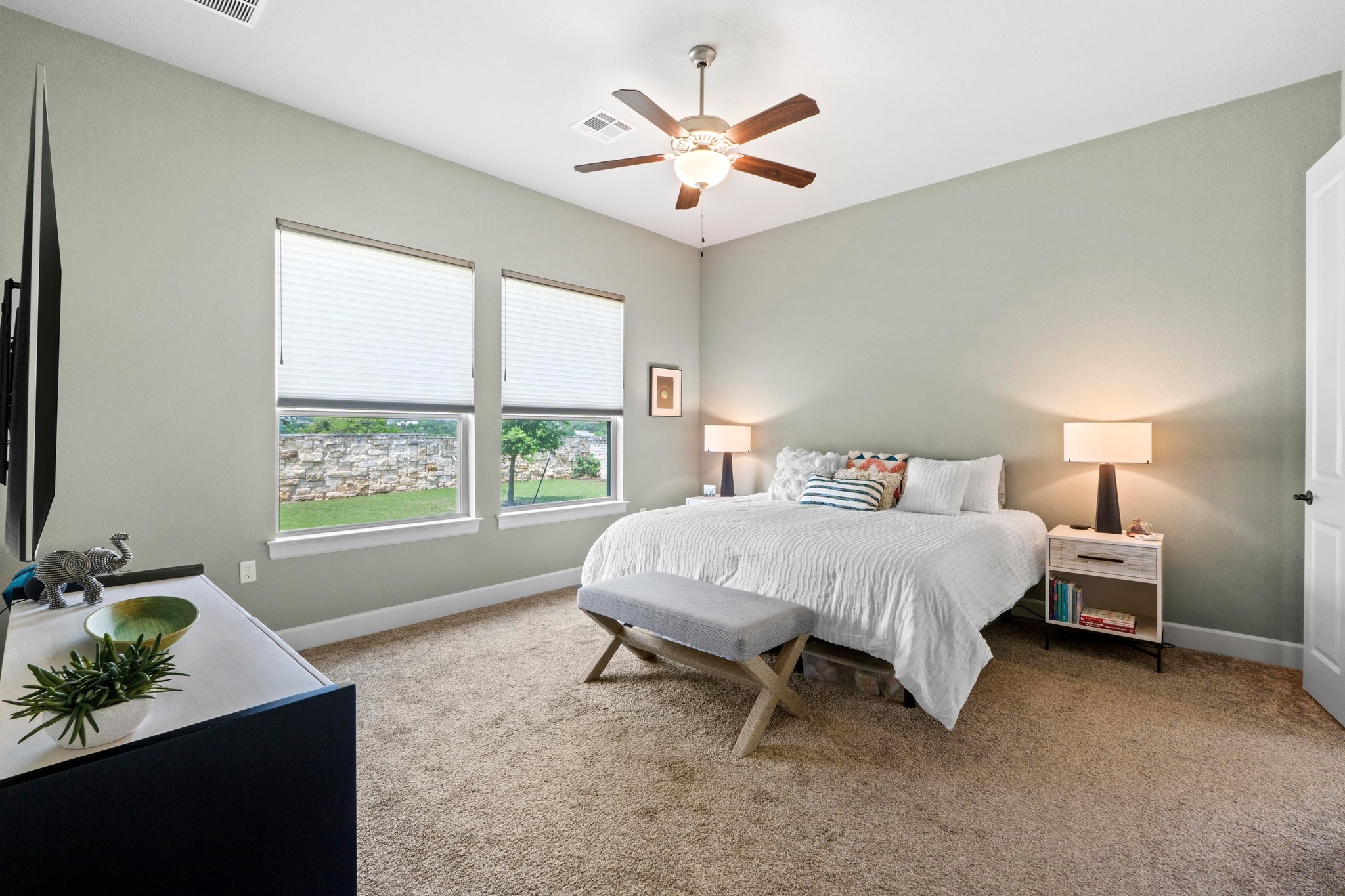 2609 Antalya Loop Leander, TX 78641 - Photo 15 of 40 a spacious bedroom with a bed and window