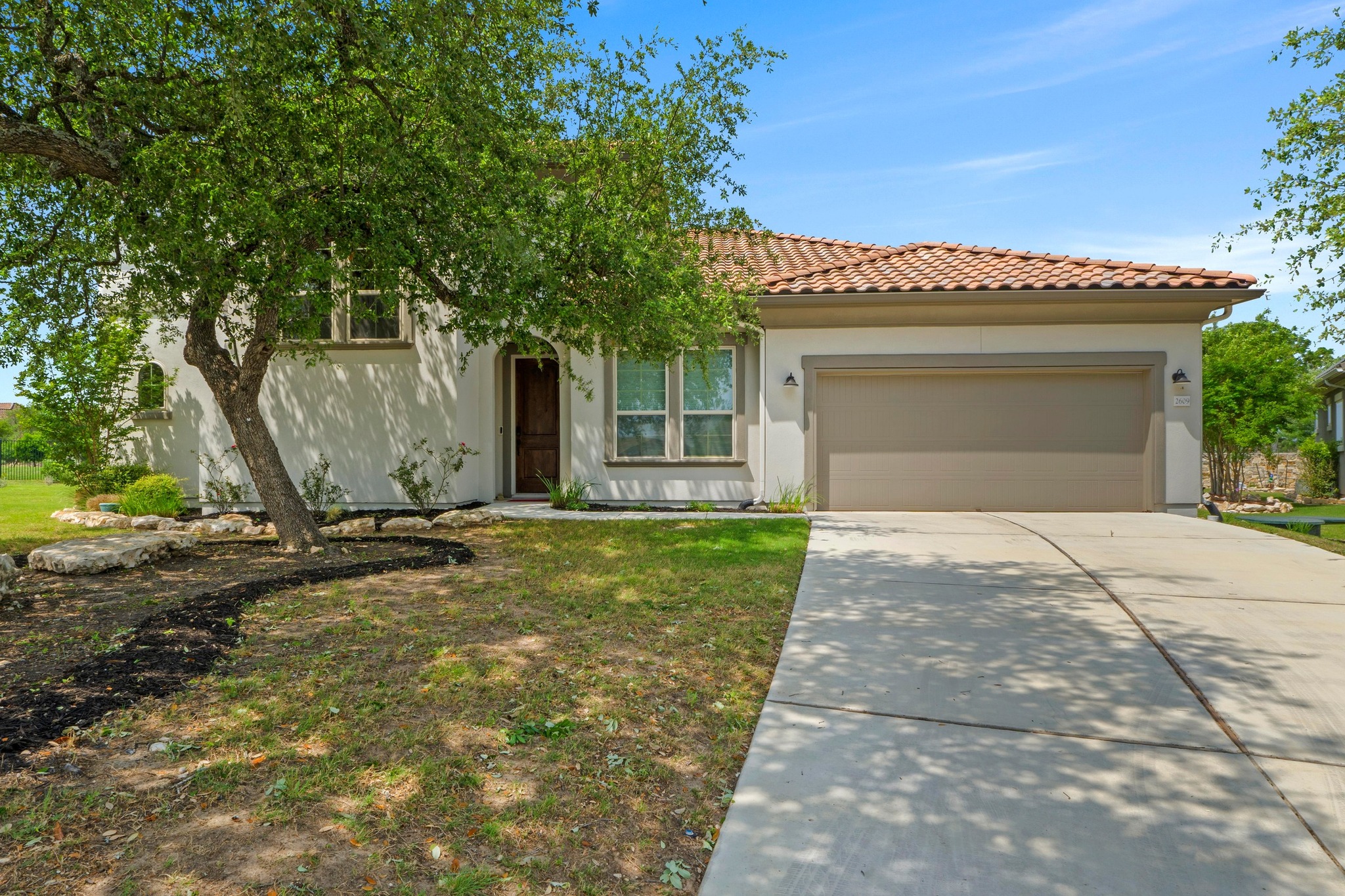 2609 Antalya Loop Leander, TX 78641 - Photo 2 of 40 a view of a house with a yard