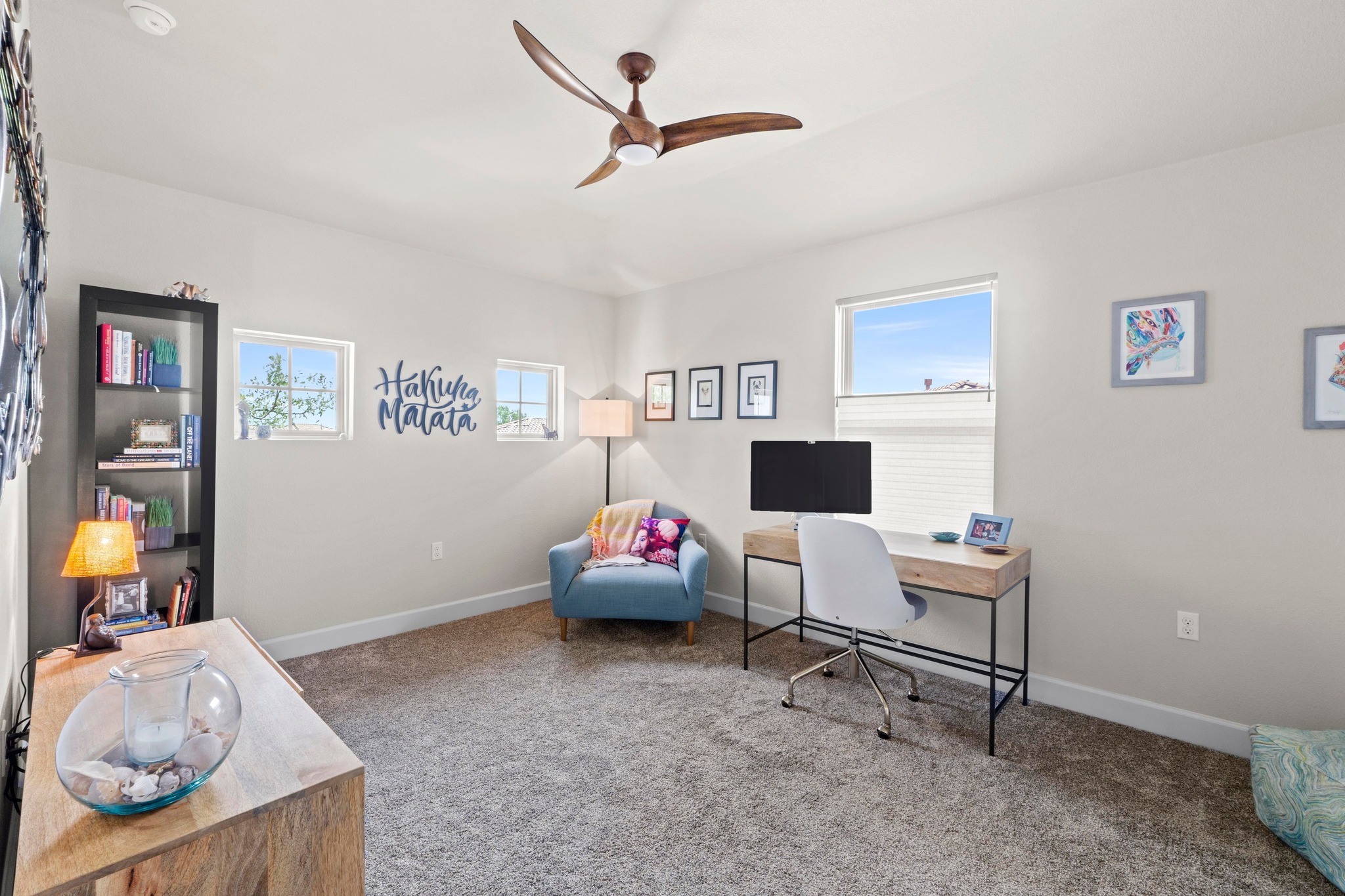 2609 Antalya Loop Leander, TX 78641 - Photo 26 of 40 a living room with furniture and a flat screen tv
