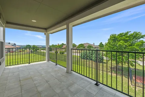 a view of a lake with a yard