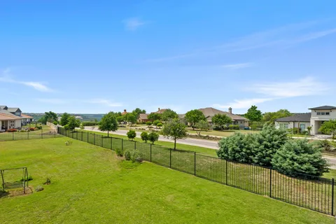 a view of a street with a building in the background