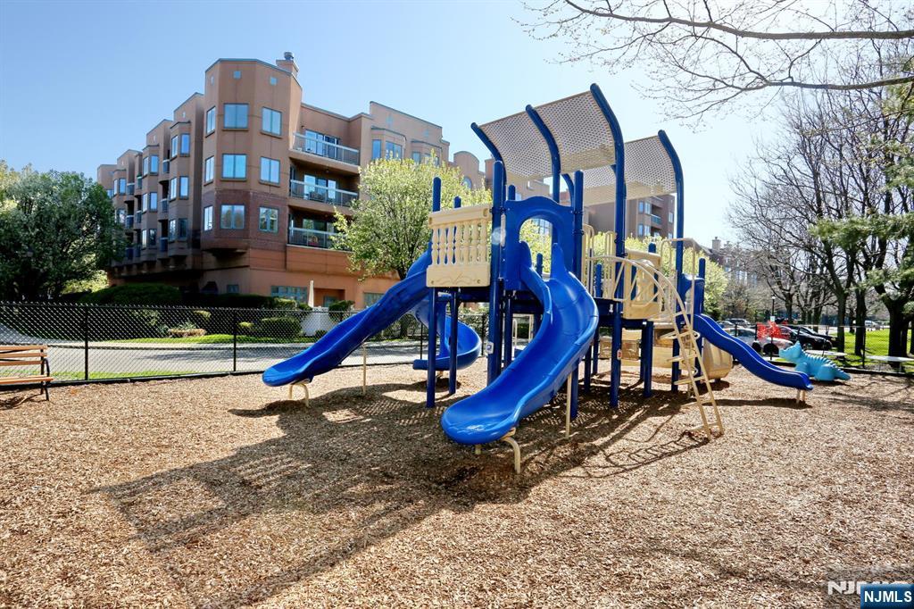 316 Nelson Court Edgewater, NJ 07020 - Photo 27 of 29 a view of a park with a slide