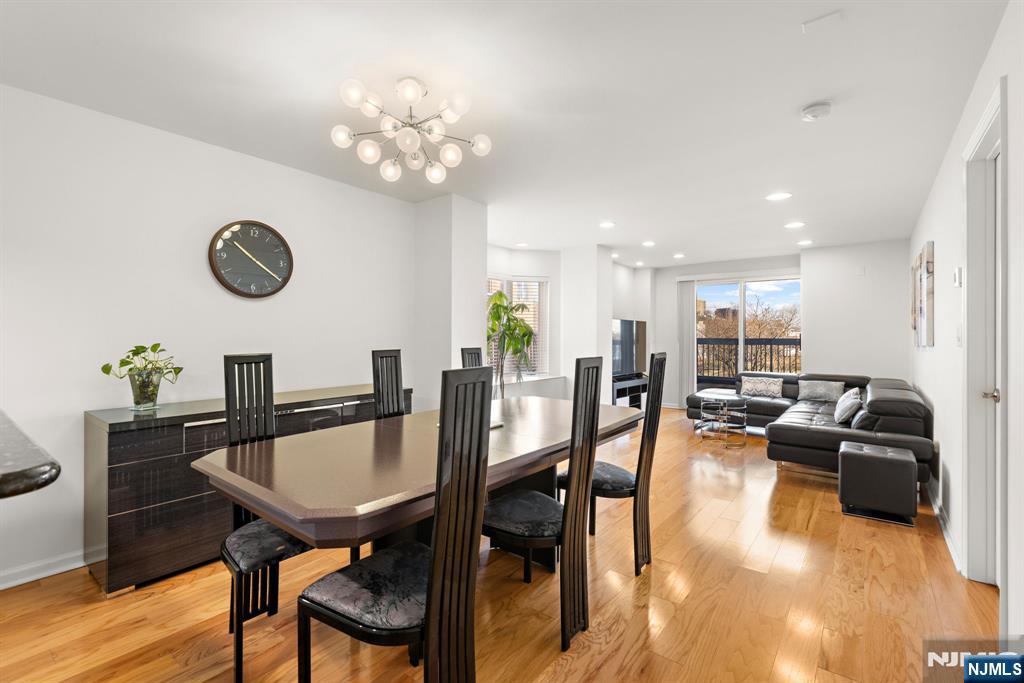 316 Nelson Court Edgewater, NJ 07020 - Photo 4 of 29 a view of a dining room with furniture and wooden floor
