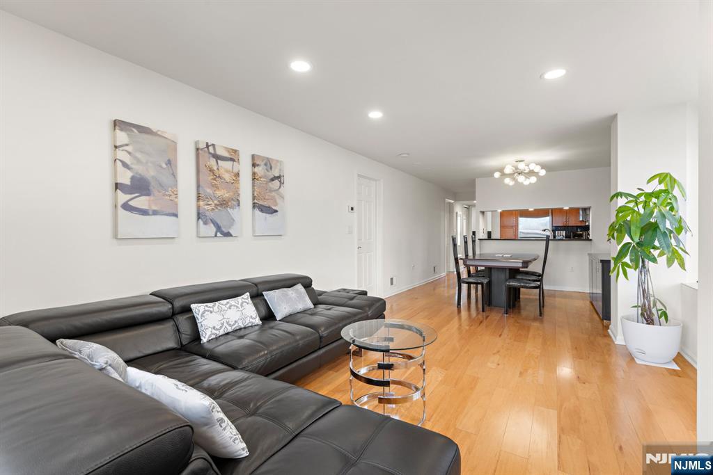 316 Nelson Court Edgewater, NJ 07020 - Photo 10 of 29 a living room with furniture and a table