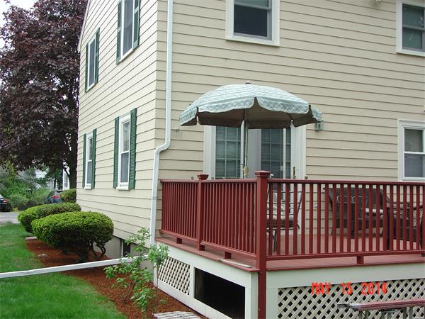 43 Johnson Road Arlington, MA 02474 - Photo 4 of 13 a front view of a house with a garden