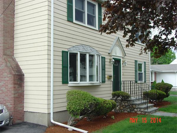 43 Johnson Road Arlington, MA 02474 - Photo 5 of 13 a view of a house with a yard