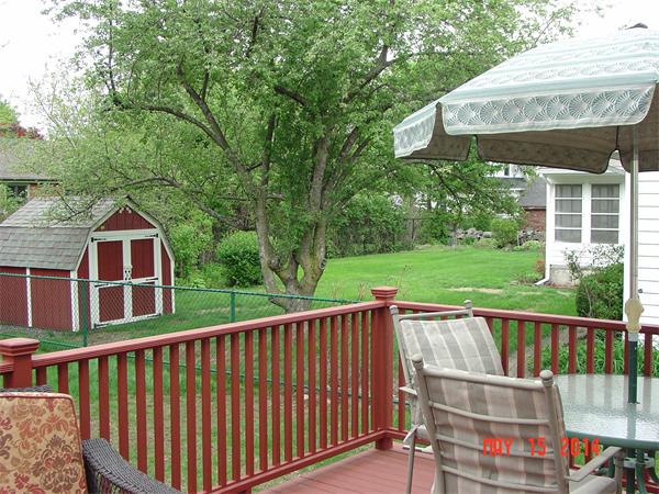 43 Johnson Road Arlington, MA 02474 - Photo 6 of 13 a view of a wooden deck and a yard with swimming pool