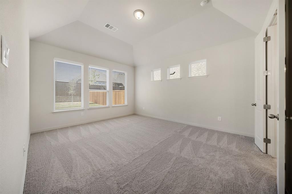 912 Alberta Spruce Road Justin, TX 76247 - Photo 17 of 35 an empty room with windows