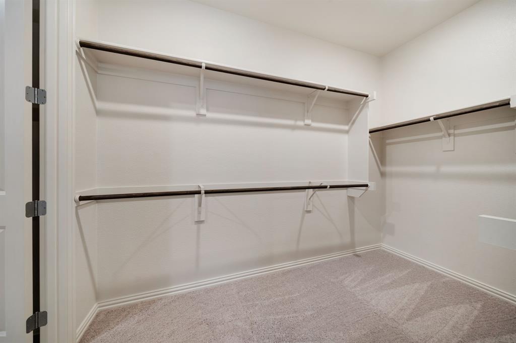 912 Alberta Spruce Road Justin, TX 76247 - Photo 22 of 35 a view of an empty walk in closet