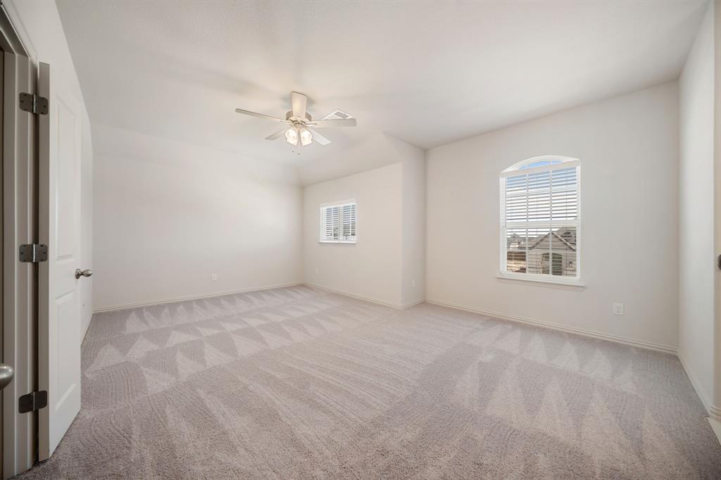 912 Alberta Spruce Road Justin, TX 76247 - Photo 24 of 35 a view of an empty room with a window