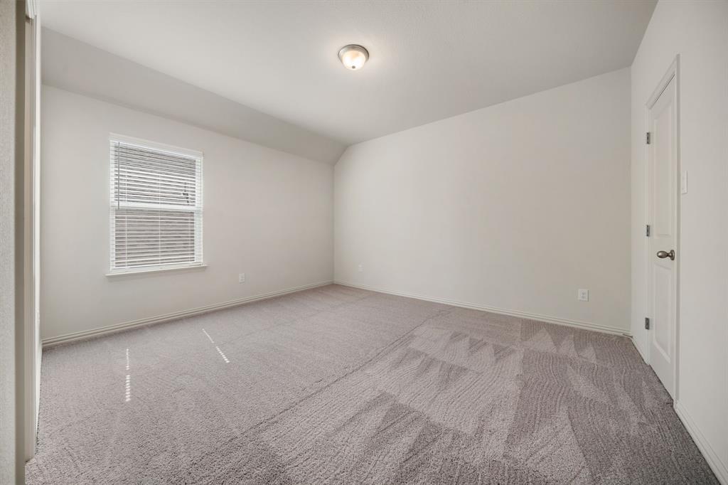 912 Alberta Spruce Road Justin, TX 76247 - Photo 26 of 35 an empty room with windows