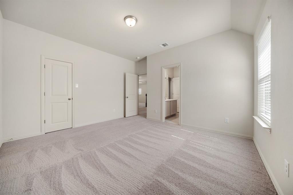 912 Alberta Spruce Road Justin, TX 76247 - Photo 27 of 35 a view of an empty room with a window
