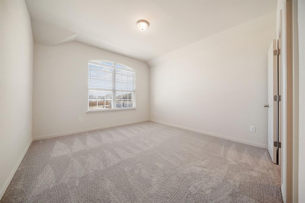 912 Alberta Spruce Road Justin, TX 76247 - Photo 30 of 35 an empty room with a window
