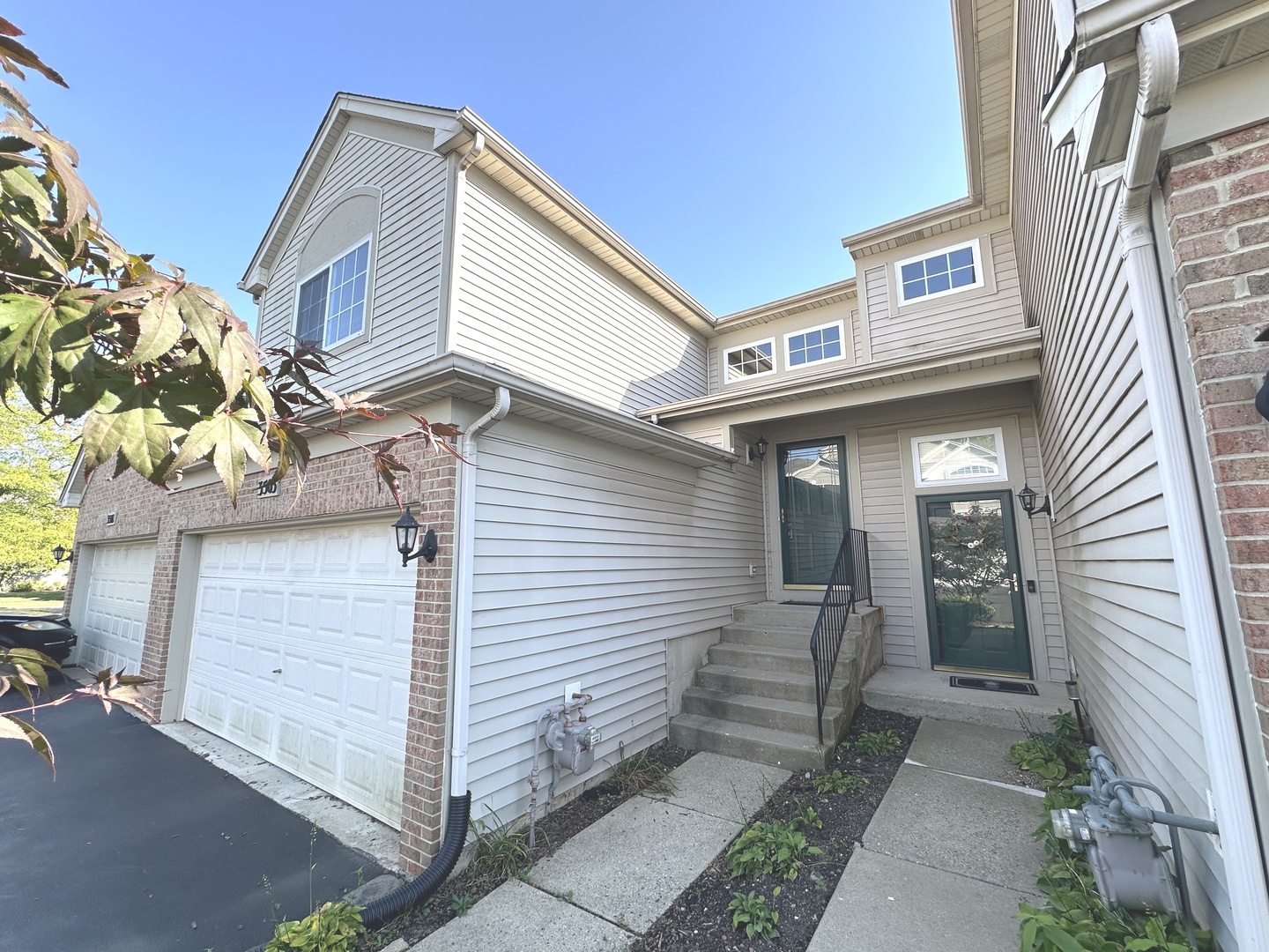 3503 Blue Ridge Court, Unit 3503 Carpentersville, IL 60110 - Photo 1 of 9 a view of a house with a garage and balcony
