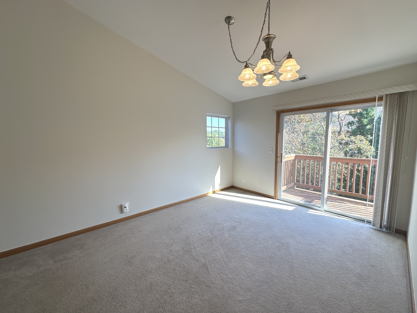 3503 Blue Ridge Court, Unit 3503 Carpentersville, IL 60110 - Photo 3 of 9 a view of an empty room with a window