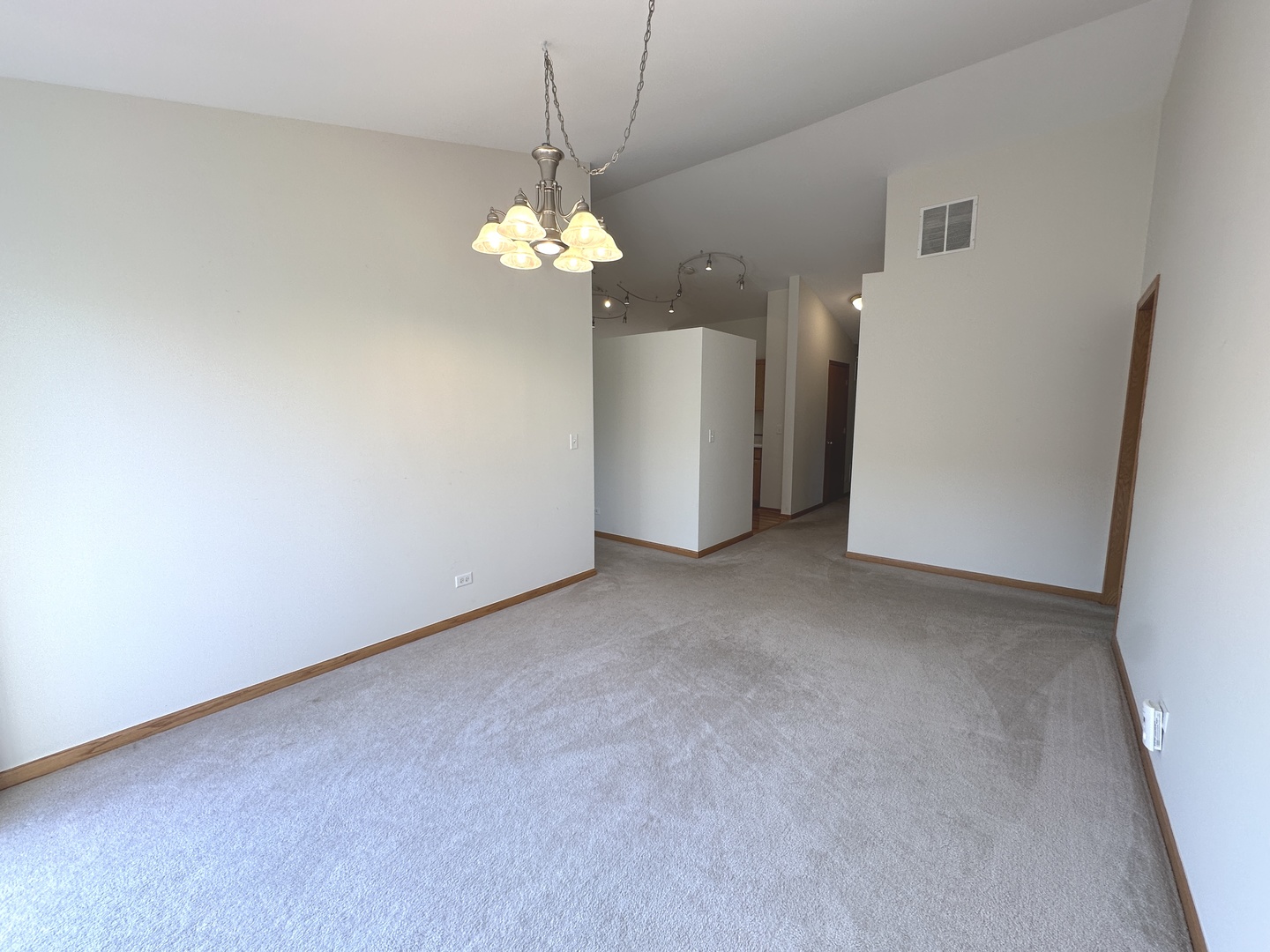 3503 Blue Ridge Court, Unit 3503 Carpentersville, IL 60110 - Photo 4 of 9 a view of a big room with chandelier fan