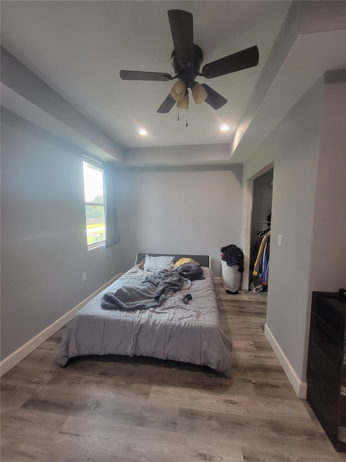 248 County Road 3572 Cleveland, TX 77327 - Photo 17 of 29 a bedroom with a bed and a window