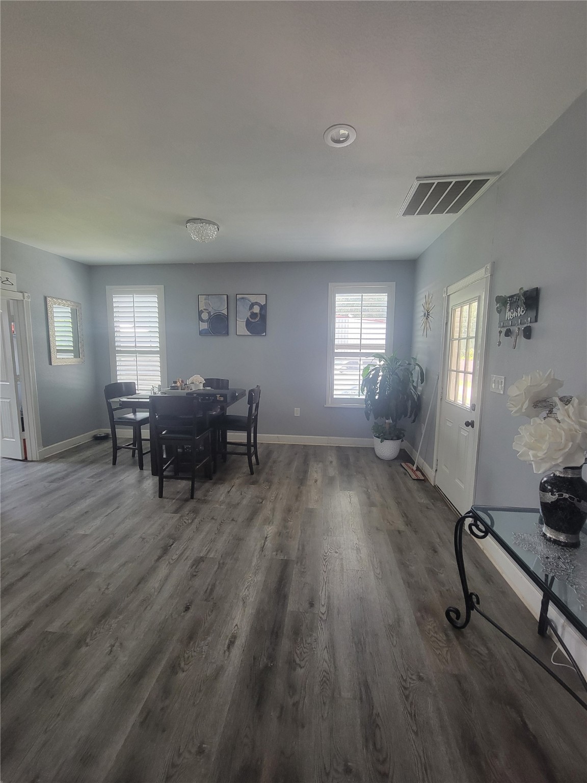 248 County Road 3572 Cleveland, TX 77327 - Photo 8 of 29 a living room with furniture and a wooden floor