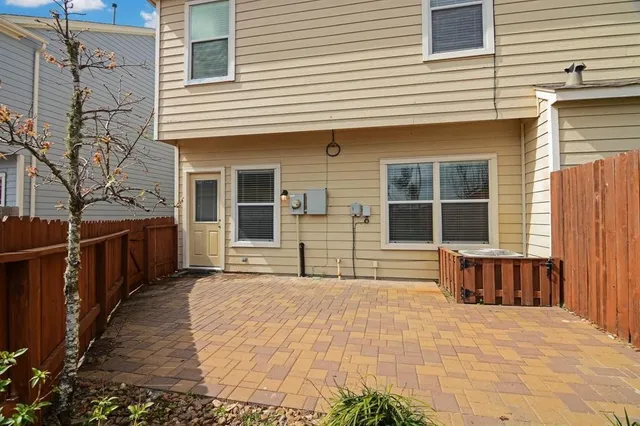 a front view of a house with a garage