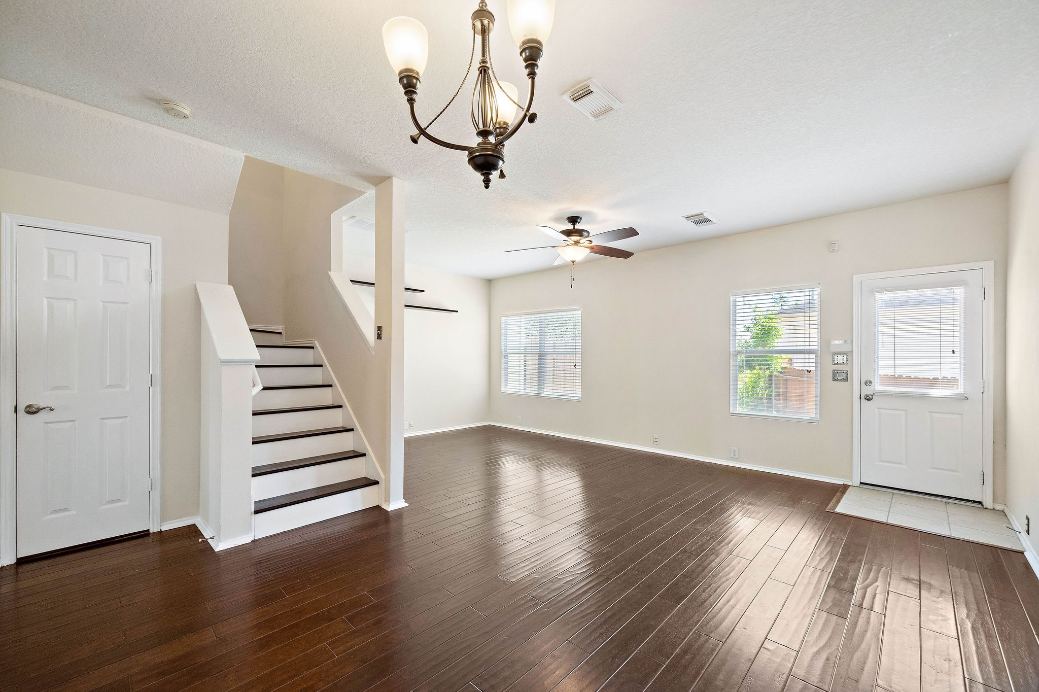 3508 Glenmore Meadow Drive Spring, TX 77386 - Photo 3 of 13 a view of wooden floor and windows in a room