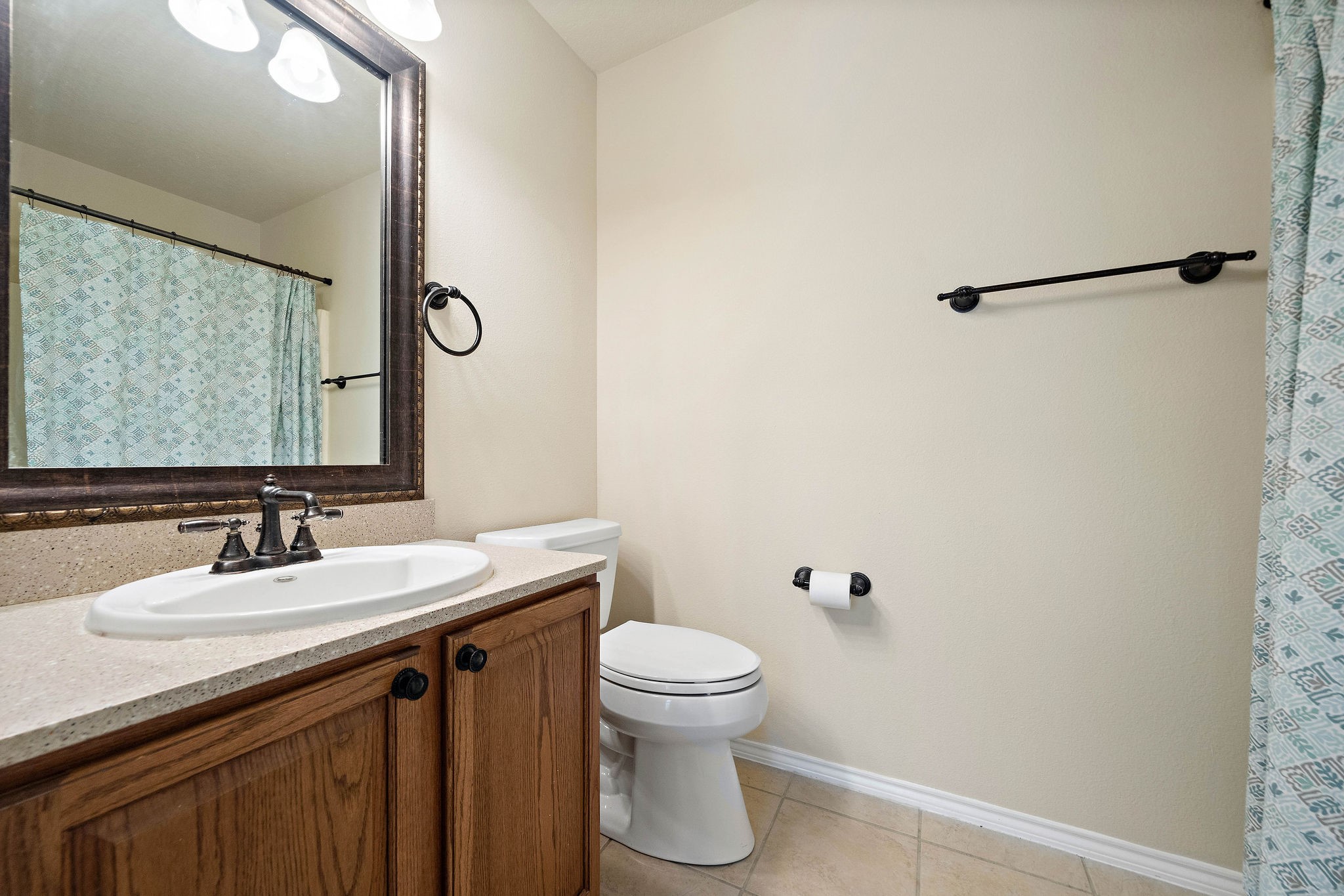 3508 Glenmore Meadow Drive Spring, TX 77386 - Photo 5 of 13 a bathroom with a sink toilet and a mirror