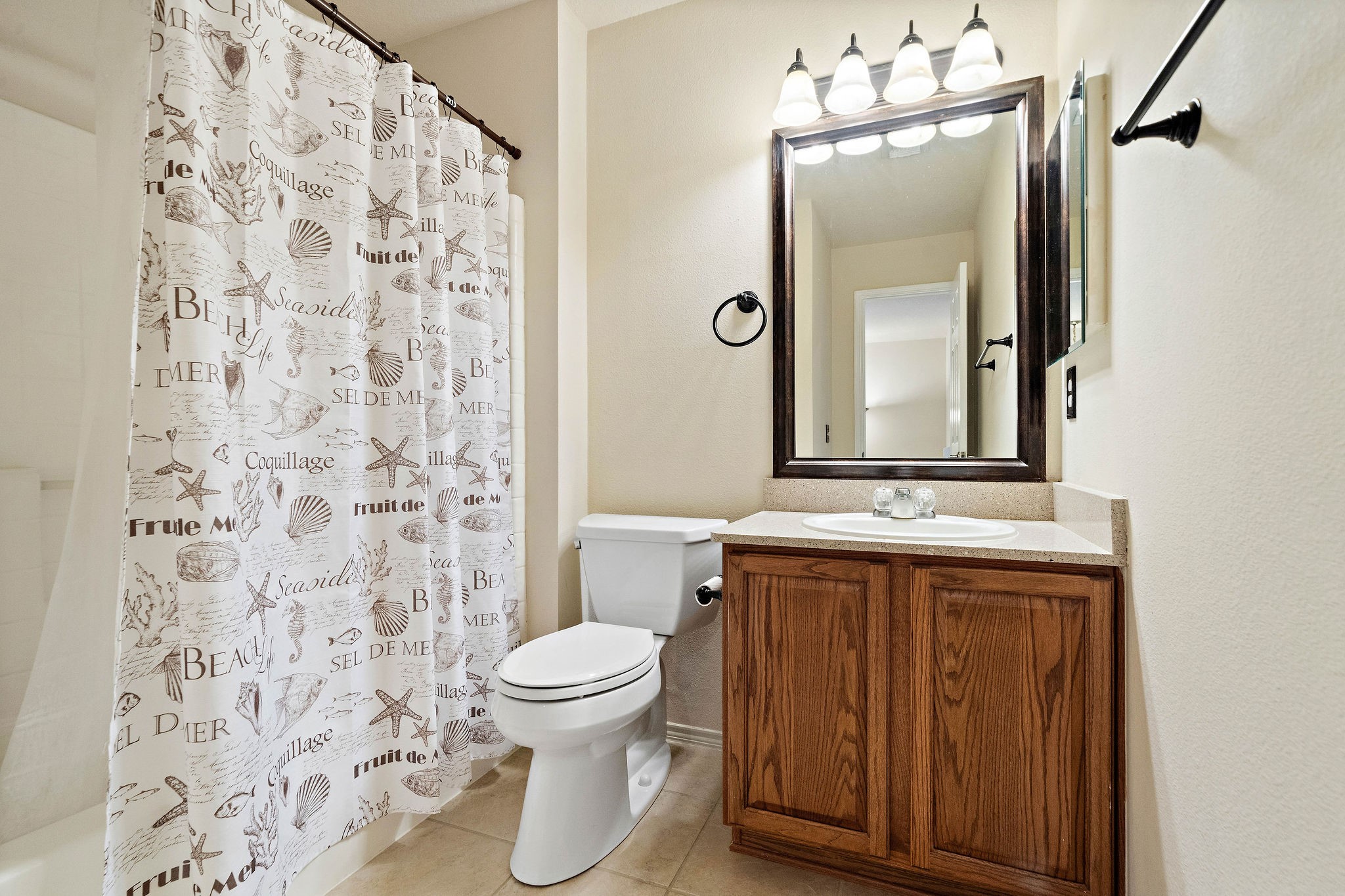 3508 Glenmore Meadow Drive Spring, TX 77386 - Photo 8 of 13 a bathroom with a sink and a mirror