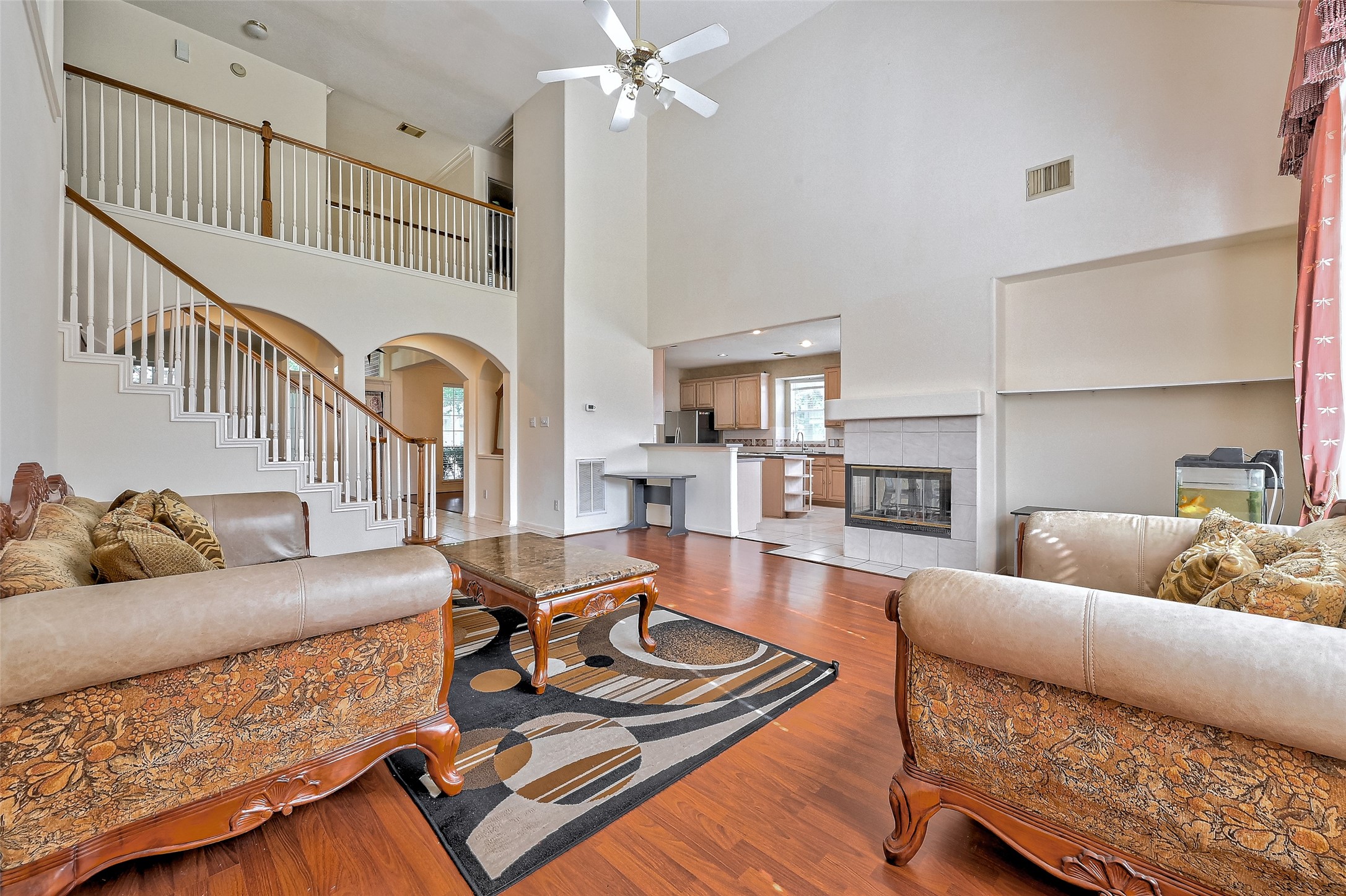 6806 Rhodes Court Missouri City, TX 77459 - Photo 14 of 50 a living room with furniture and a rug