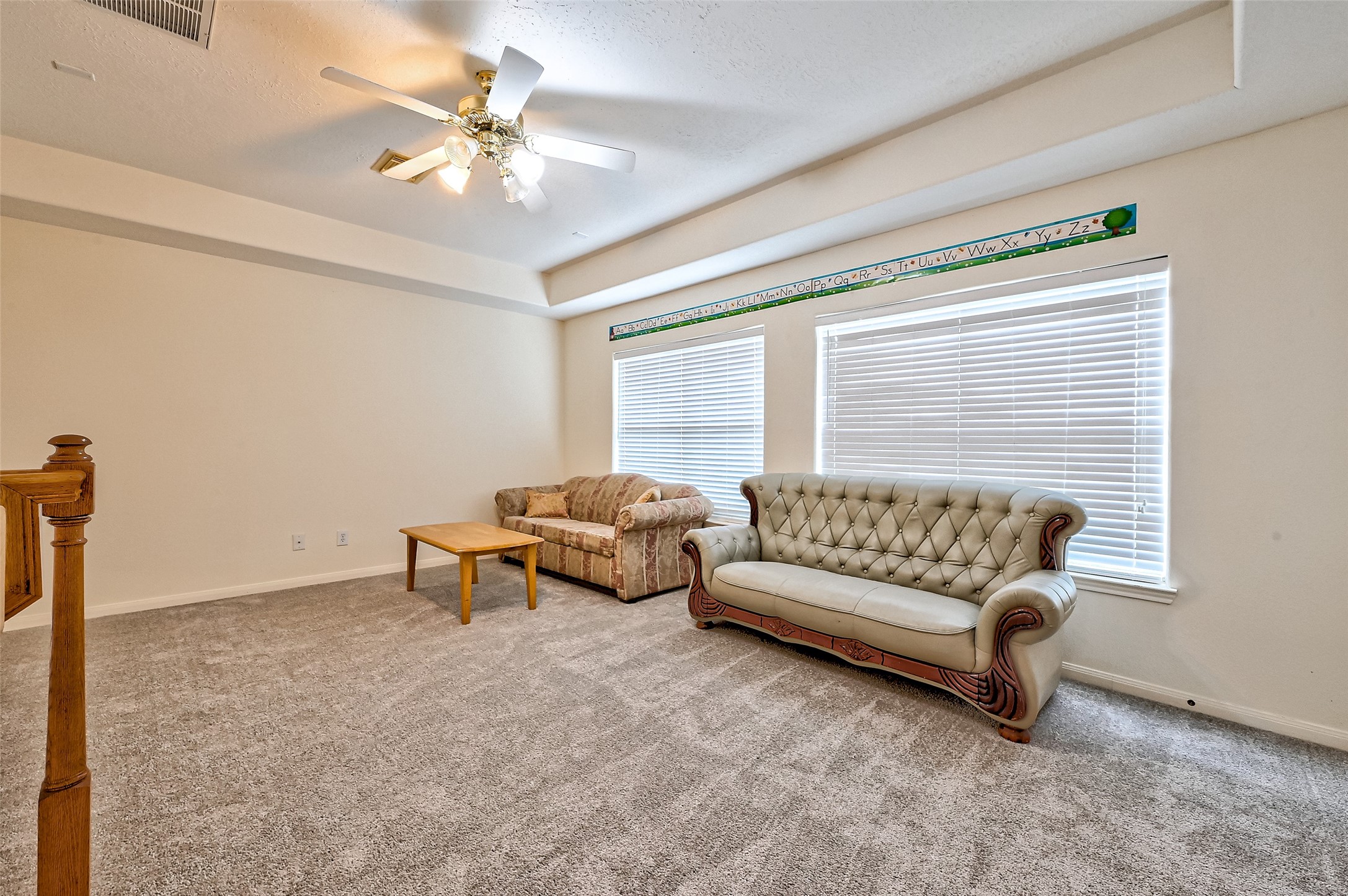 6806 Rhodes Court Missouri City, TX 77459 - Photo 45 of 50 a bedroom with furniture and a ceiling fan