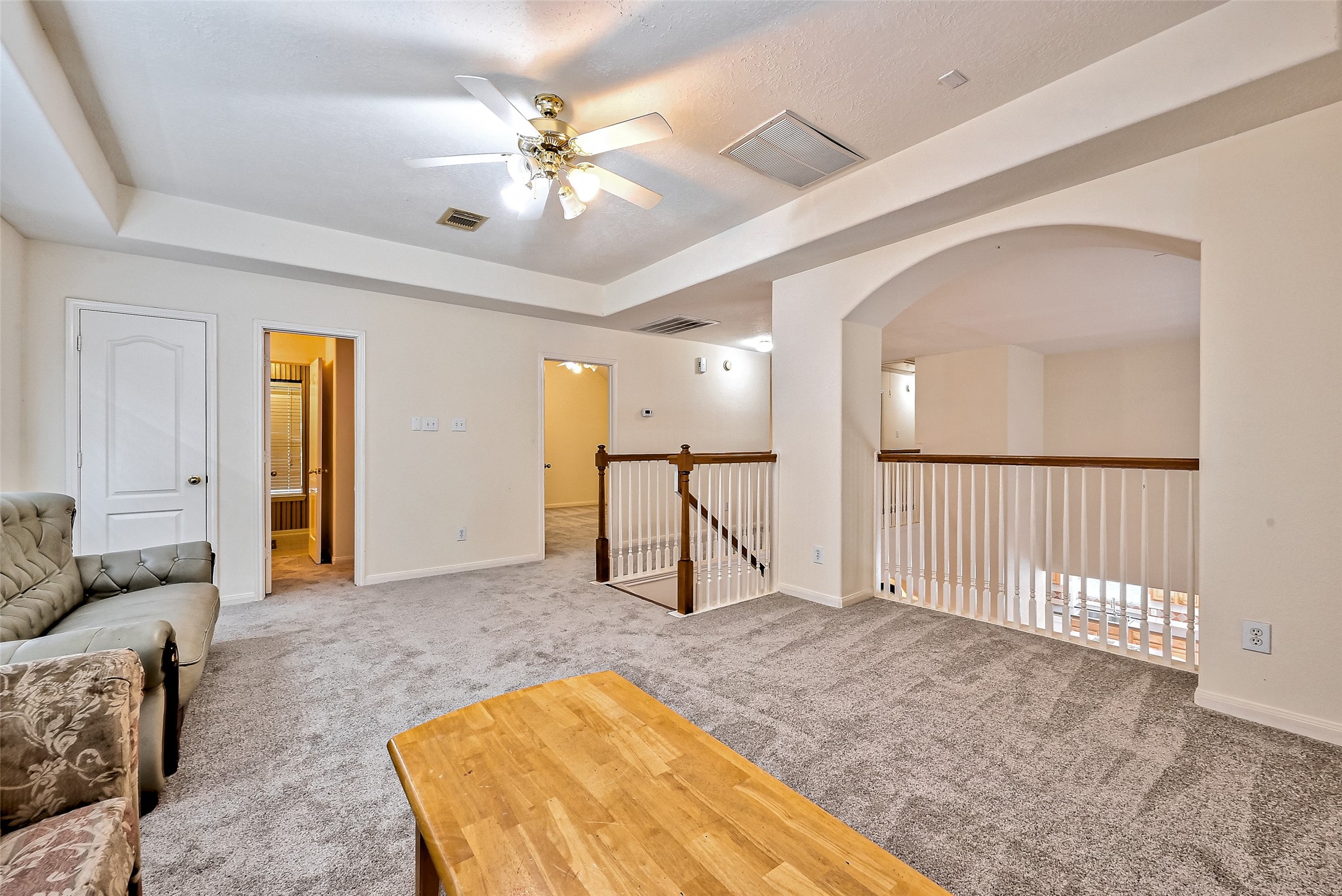 6806 Rhodes Court Missouri City, TX 77459 - Photo 46 of 50 a living room with furniture and a chandelier