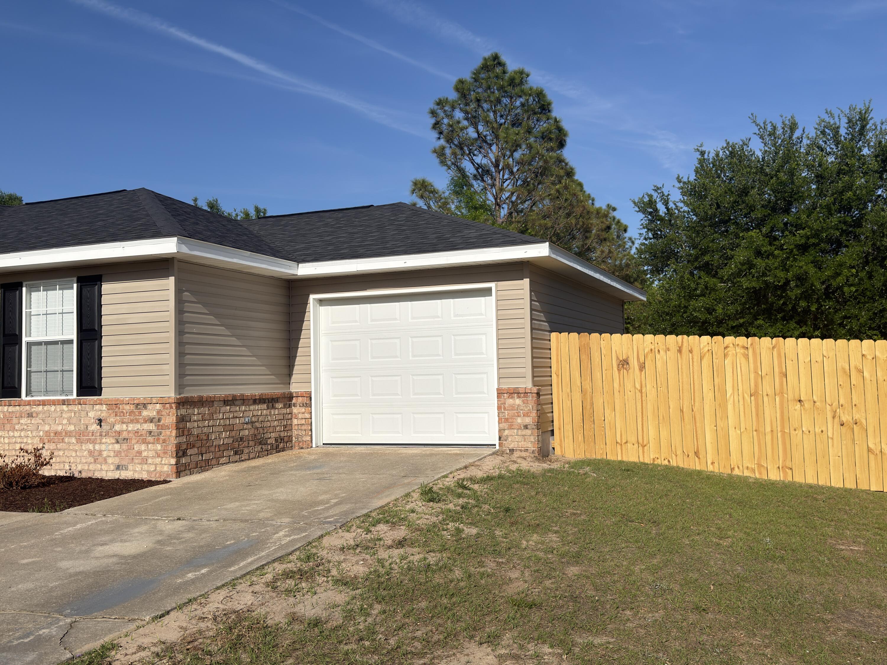 6121 Robin Road Crestview, FL 32539 - Photo 25 of 26 a view of a house with a outdoor space