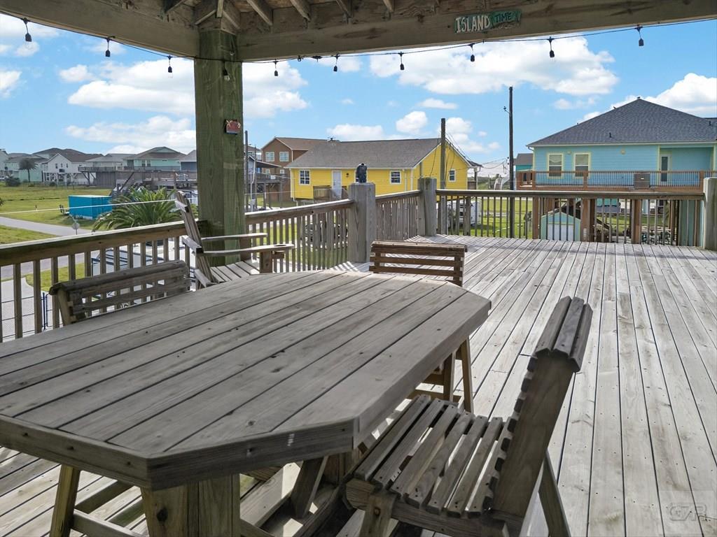 1739 Pompano Lane Crystal Beach, TX 77650 - Photo 10 of 20 a balcony with table and chairs