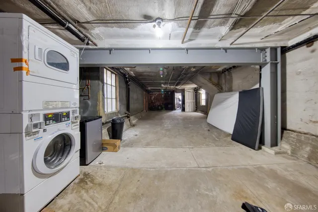 a view of a storage & utility room with washer and dryer