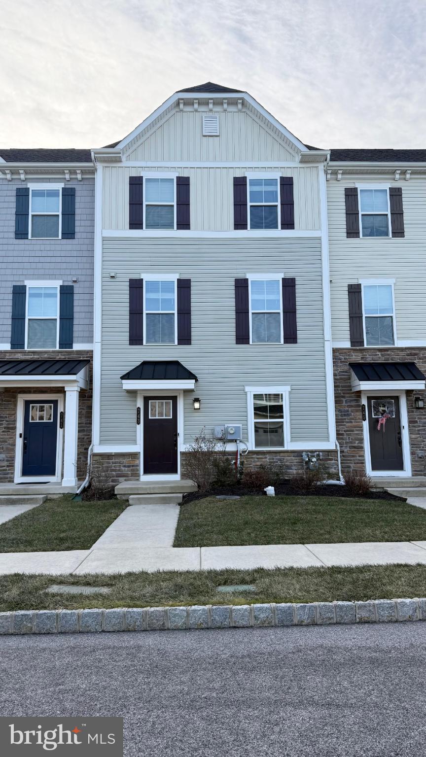 Charming townhome with classic curb appeal.