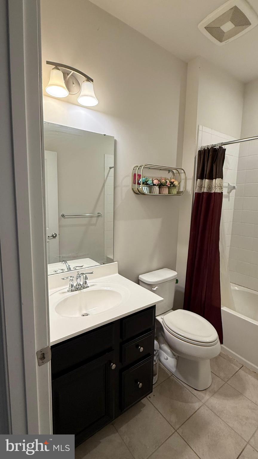 743 Quarry Road Malvern, PA 19355 - Photo 14 of 20 a bathroom with a sink a toilet a mirror and vanity
