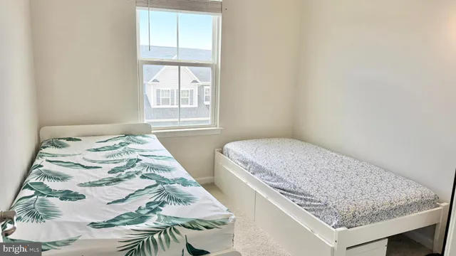 a bedroom with a bed and dresser