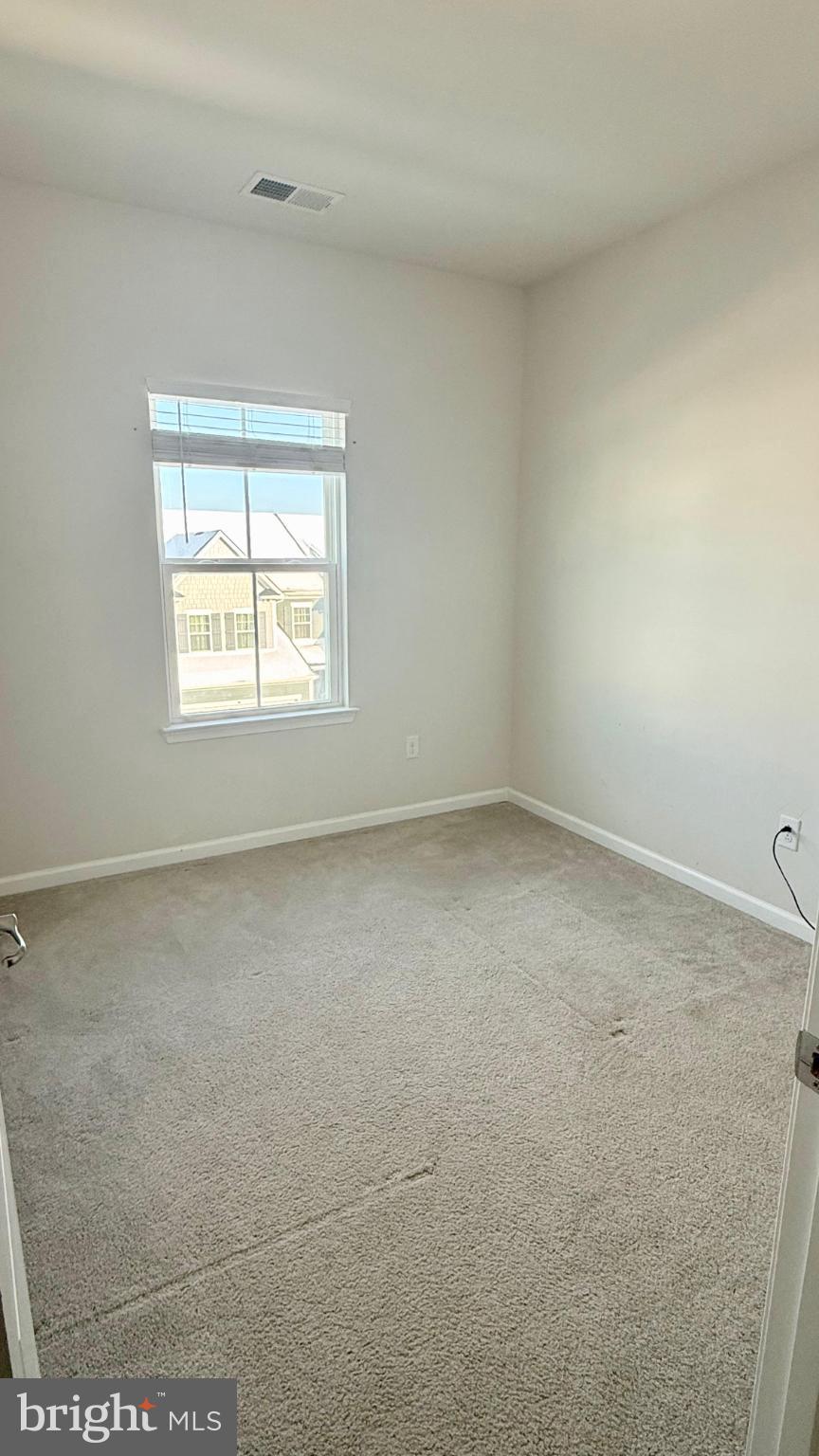 743 Quarry Road Malvern, PA 19355 - Photo 19 of 20 an empty room with a window