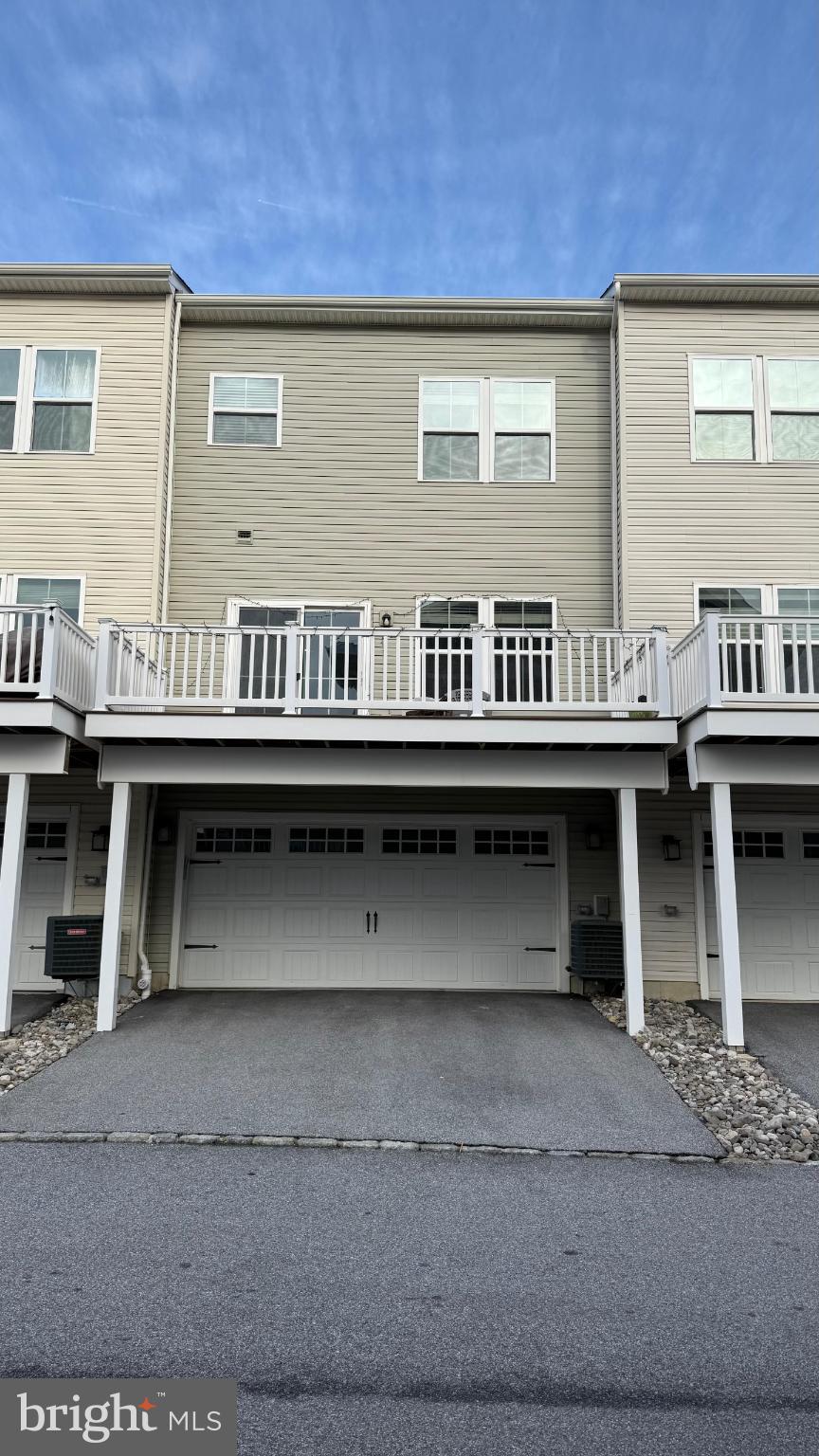 743 Quarry Road Malvern, PA 19355 - Photo 4 of 20 a view of a chairs and table on the balcony
