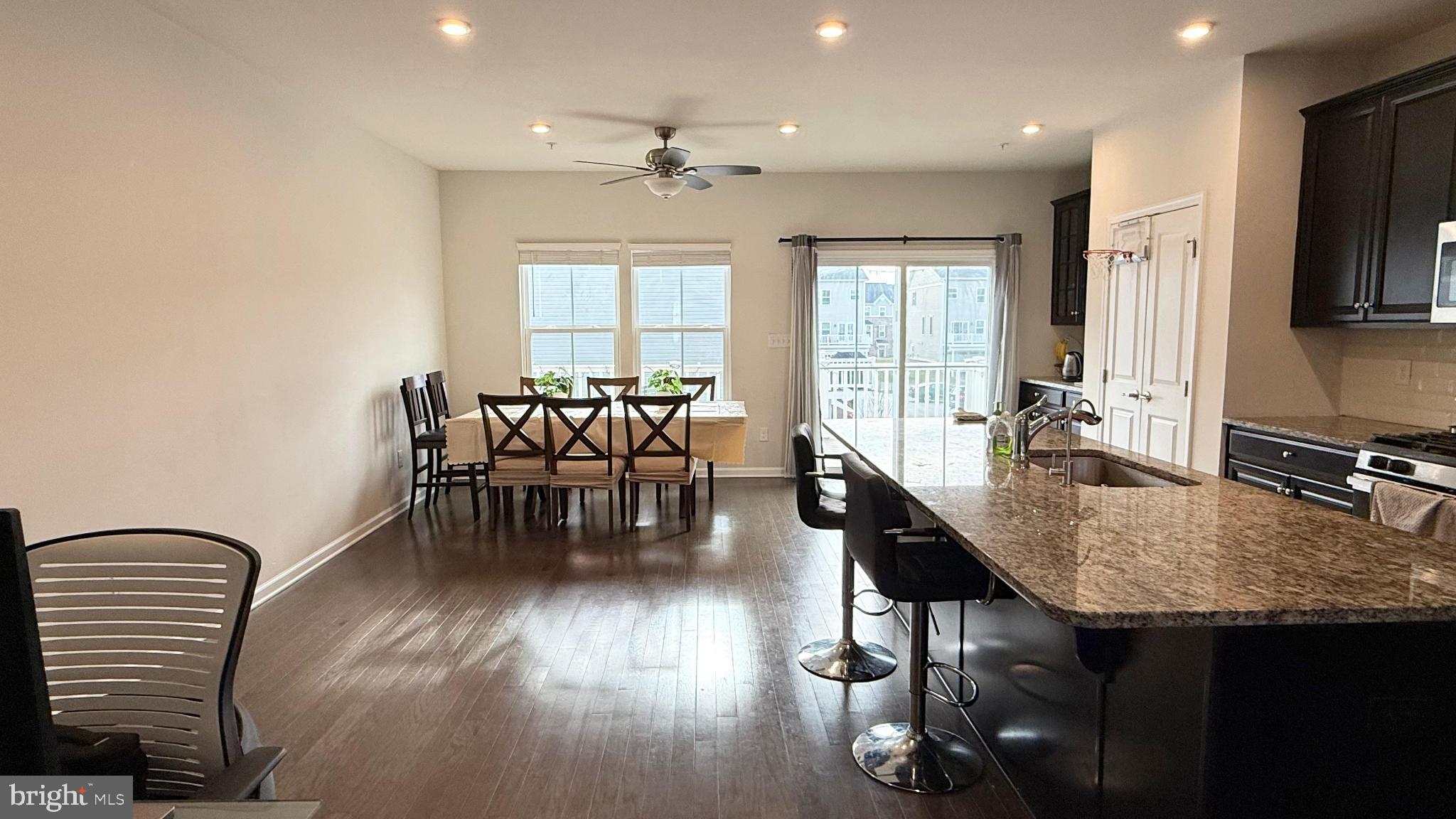 743 Quarry Road Malvern, PA 19355 - Photo 10 of 20 a view of a dining room with furniture window and wooden floor