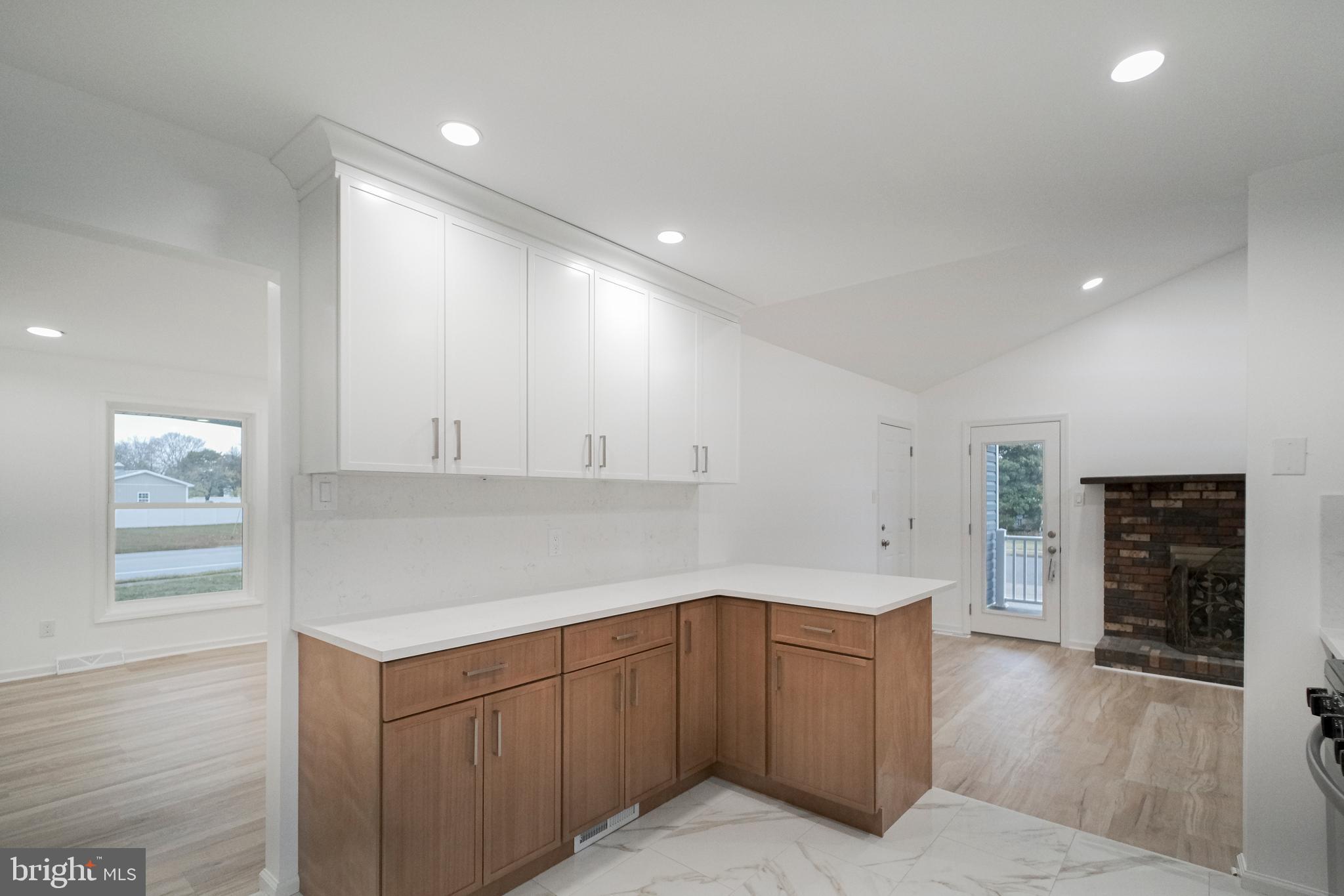 125 North Shore Road Marmora, NJ 08223 - Photo 9 of 26 a kitchen with cabinets and window