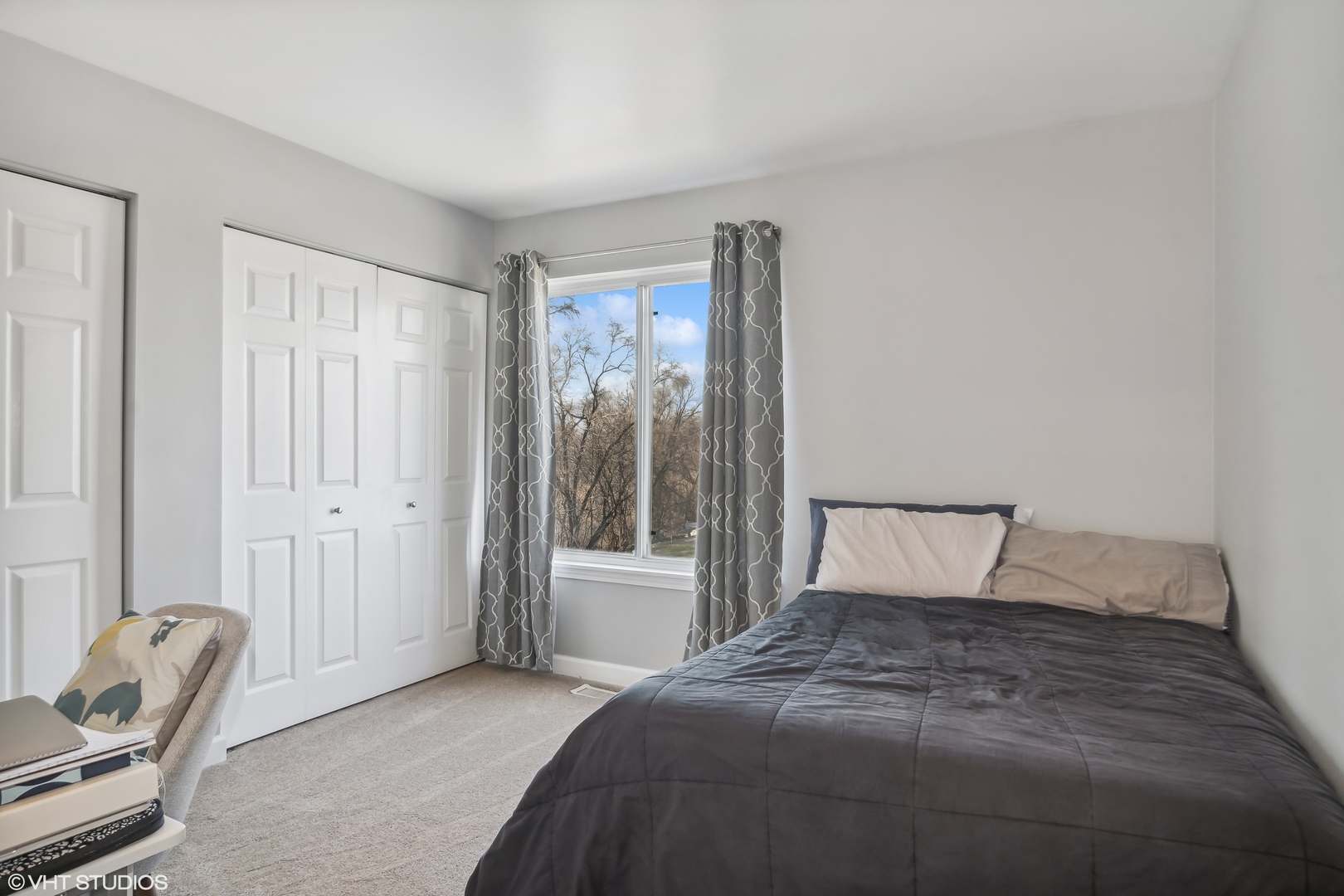 1545 Spaulding Road Bartlett, IL 60103 - Photo 14 of 21 a bedroom with a bed and chair