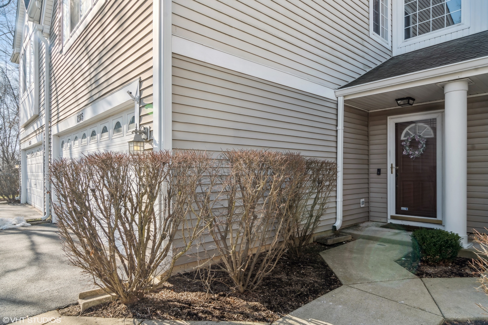 1545 Spaulding Road Bartlett, IL 60103 - Photo 2 of 21 a front view of a house with a yard