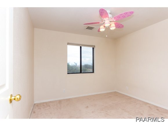 11801 Henderson Road Dewey-Humboldt, AZ 86327 - Photo 12 of 19 a view of an empty room with a window