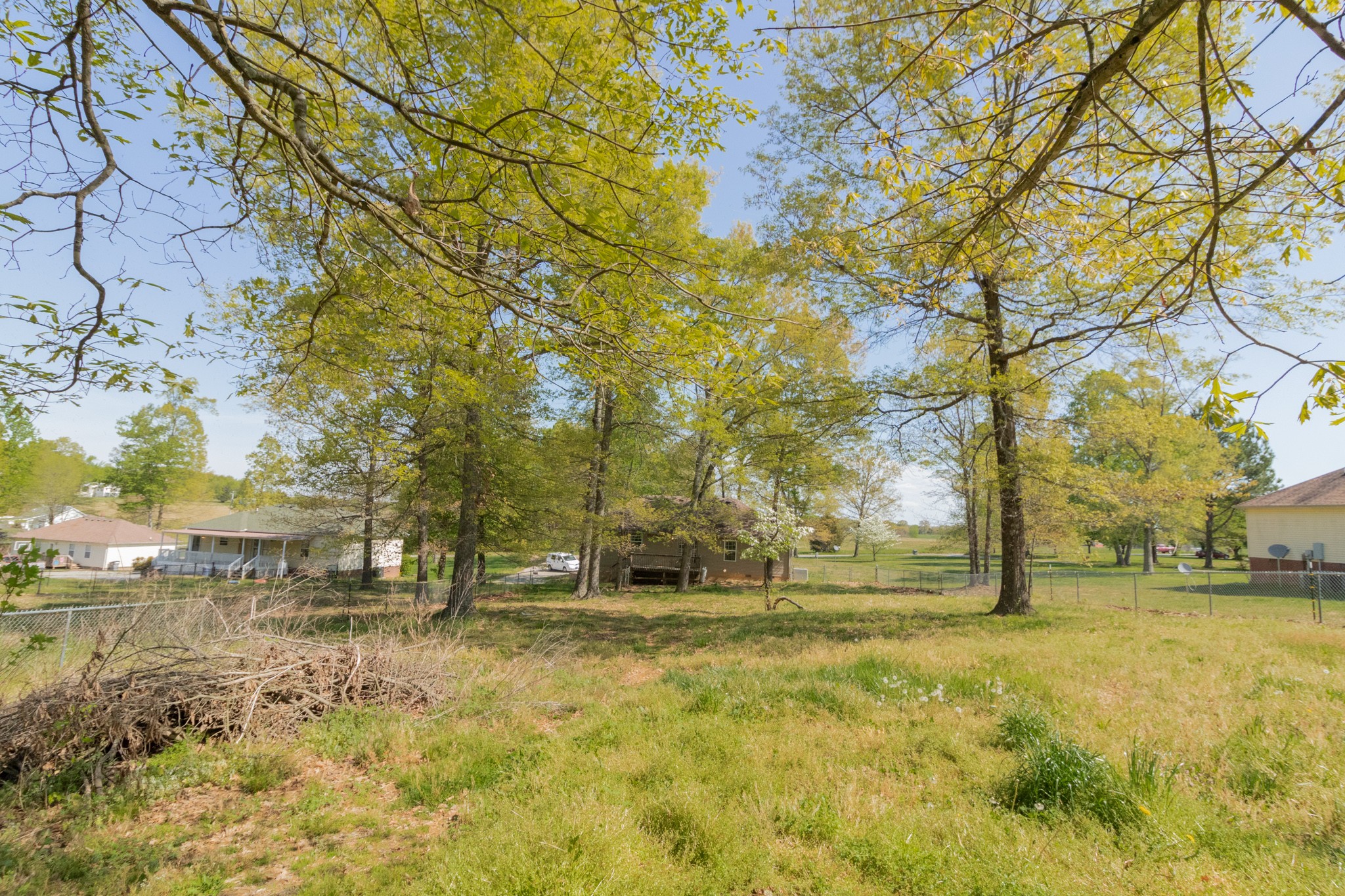 170 Switchboard Road Portland, TN 37148 - Photo 22 of 24 a backyard of apartments with large trees