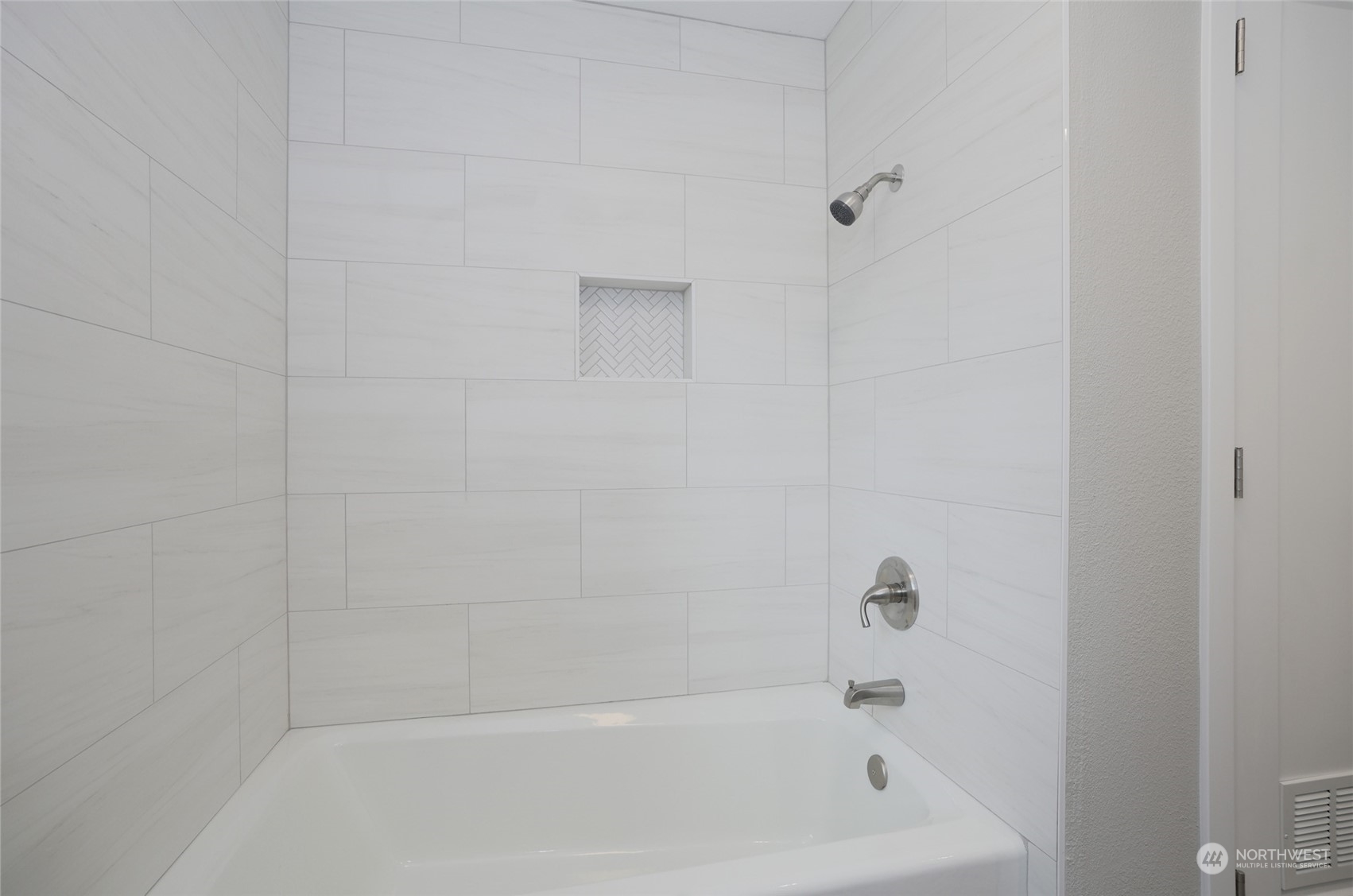 11012 Military Road Southwest Lakewood, WA 98498 - Photo 23 of 34 a close up of a bathtub curtain