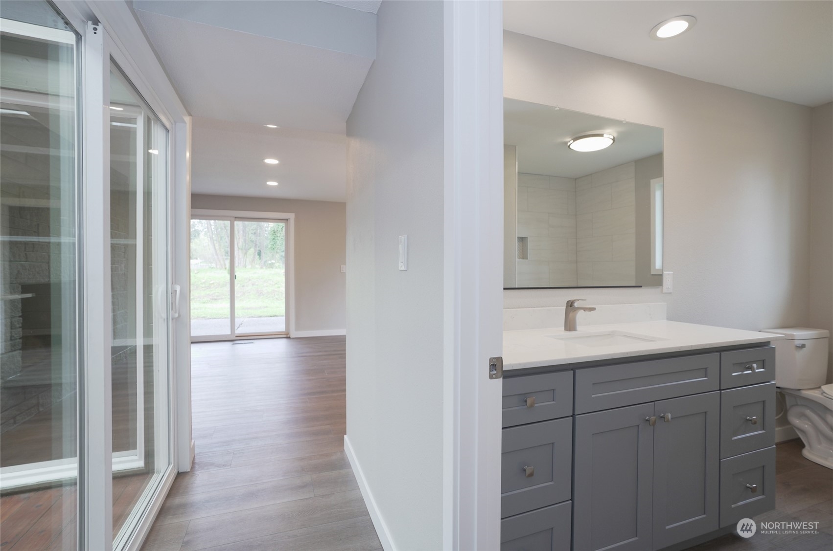 11012 Military Road Southwest Lakewood, WA 98498 - Photo 24 of 34 a bathroom with a sink and a mirror