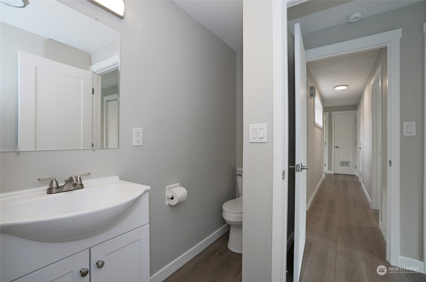 11012 Military Road Southwest Lakewood, WA 98498 - Photo 28 of 34 a bathroom with a sink and a mirror