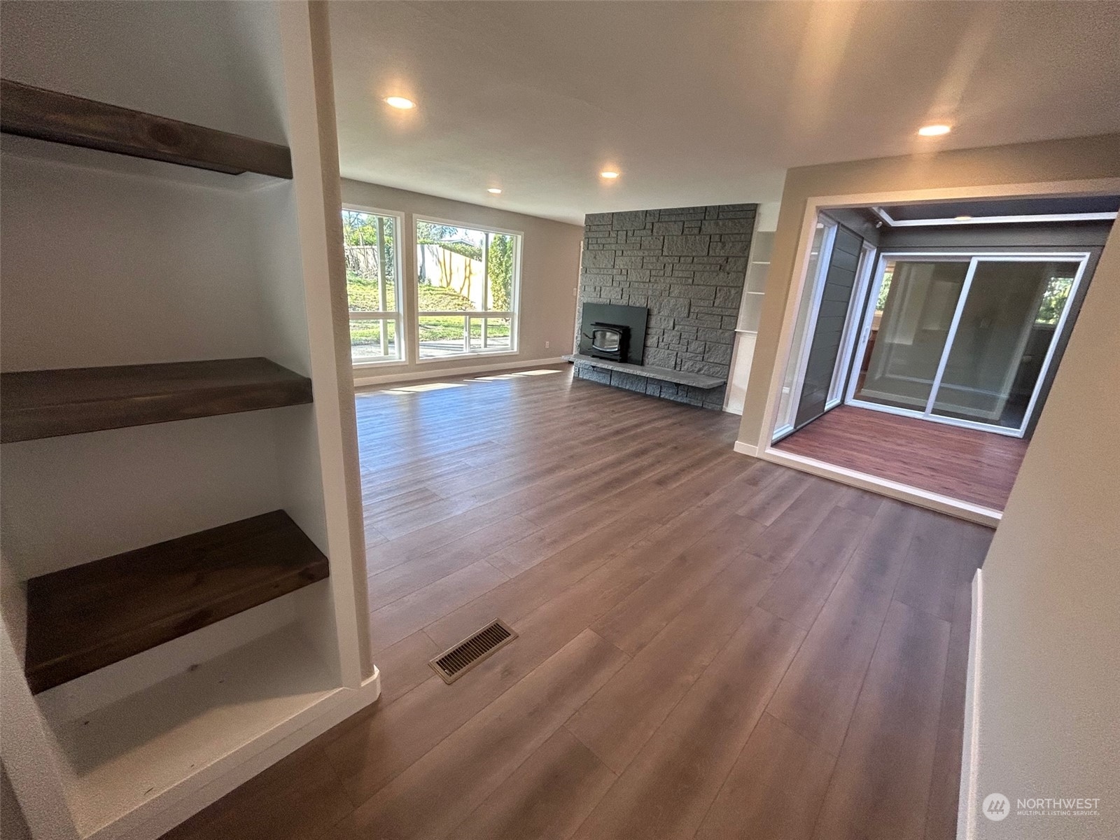 11012 Military Road Southwest Lakewood, WA 98498 - Photo 7 of 34 wooden floor in an empty room with a window