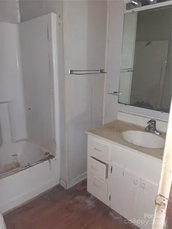 a bathroom with a sink and a bathtub